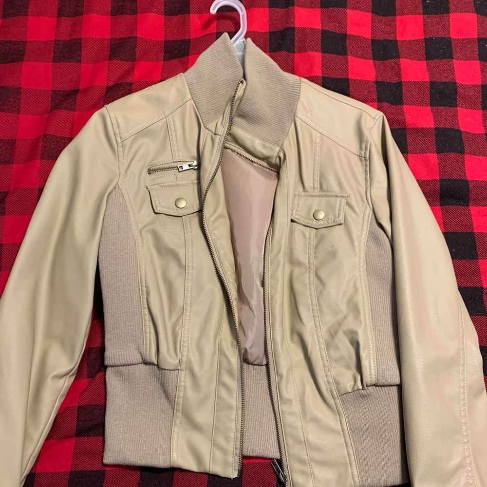 Pair of faux leather jackets